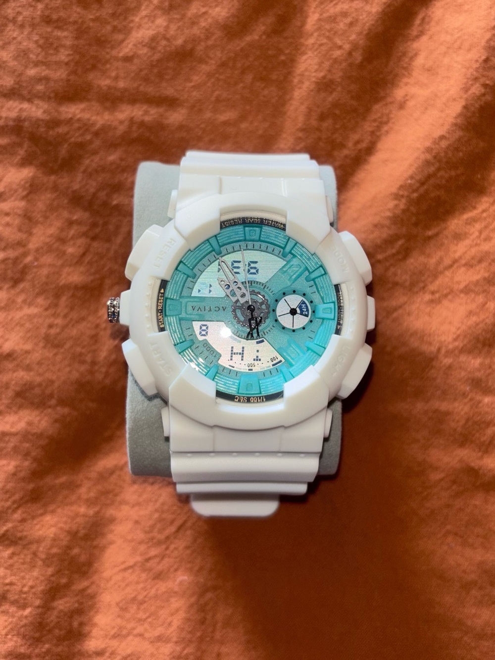Invicta Activa White and Teal Sport Chronograph Watch